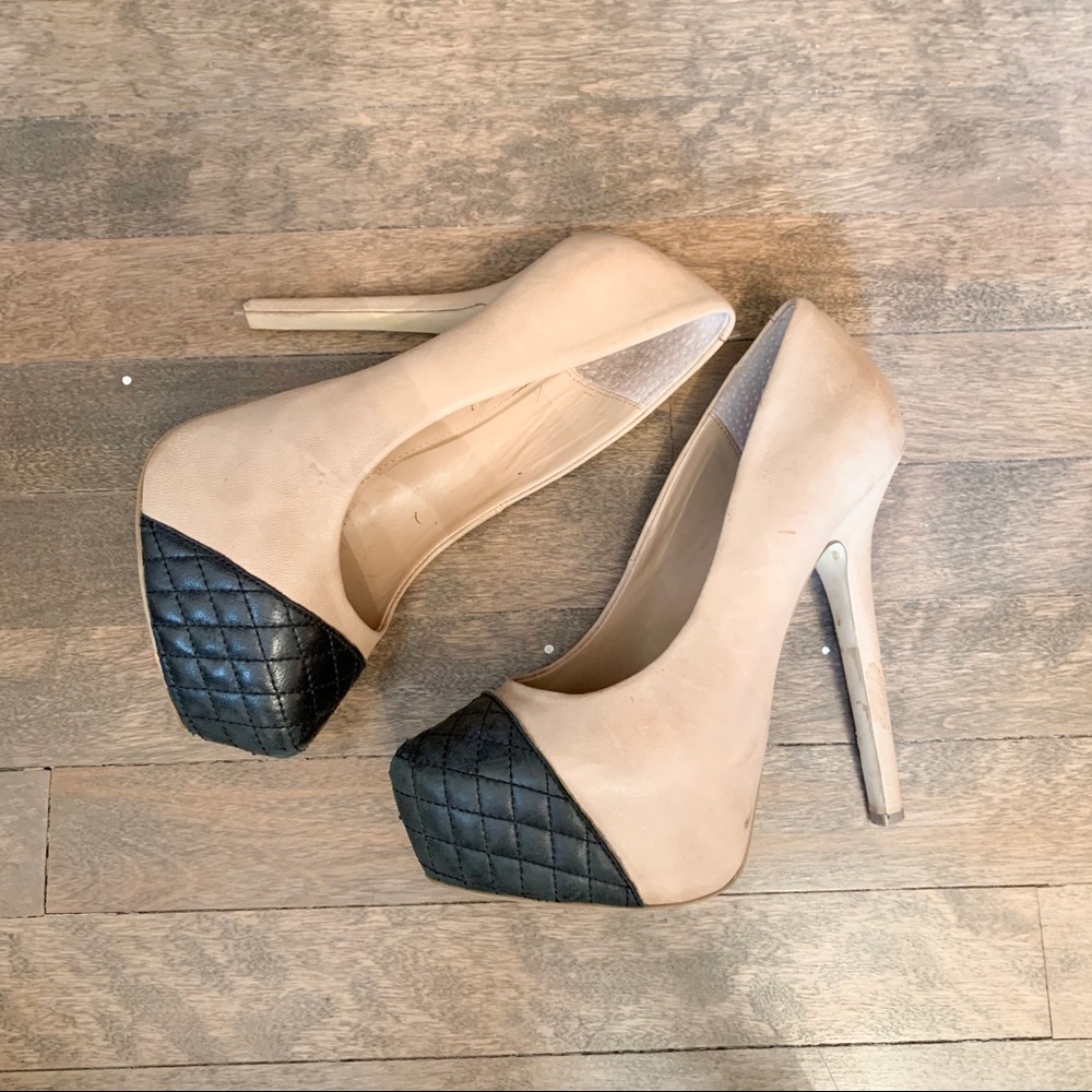 Steve Madden Black and Tan platform pumps